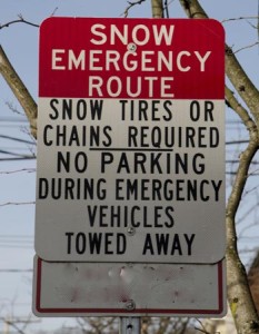Signs like these mark the snow emergency routes downtown.